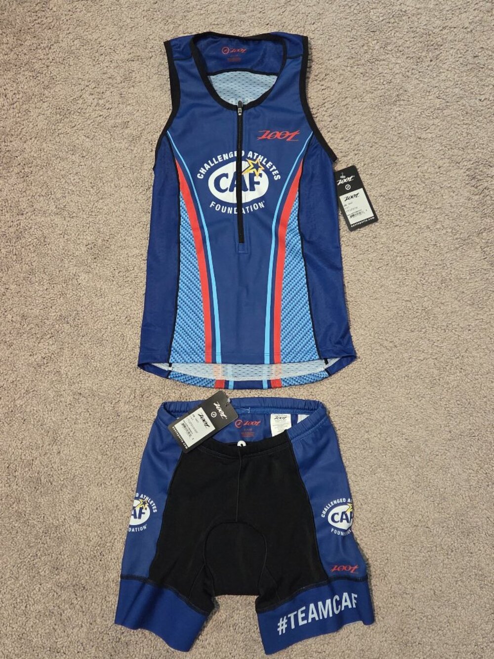 Zoot triathlon set, size small, New with tags, blue, orange & black